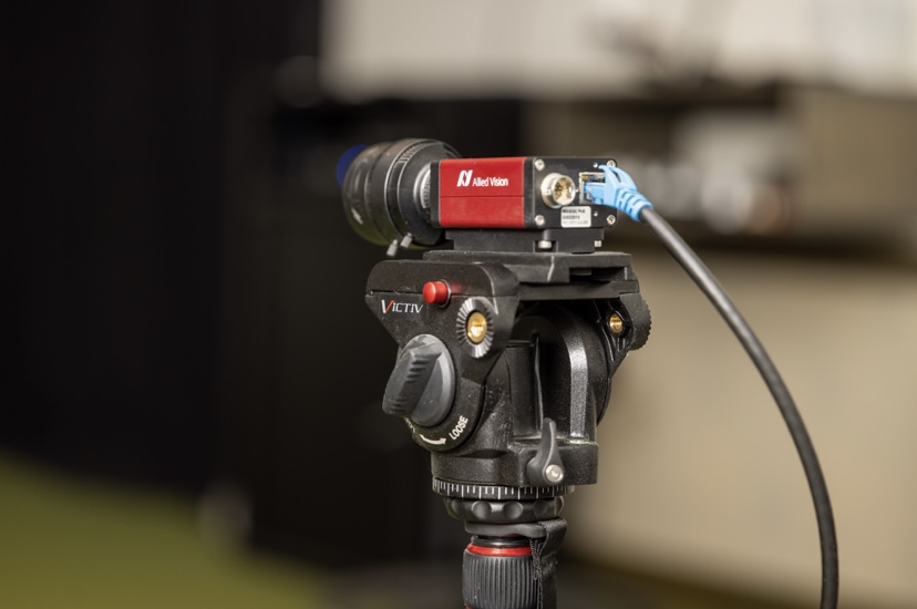 High-Speed Golf Swing Camera – Coleman Golf Coaching Richmond High-speed camera on tripod used by Richmond golf coach for tour-level swing capture and analysis at Coleman Golf Coaching studio
