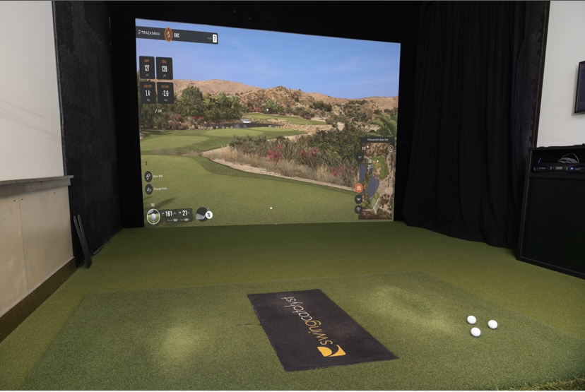 Richmond Personalized Golf Coaching Center with TrackMan and Swing Catalyst Indoor golf simulator with TrackMan and Swing Catalyst at Coleman Golf Coaching year -round studio in Richmond Virginia